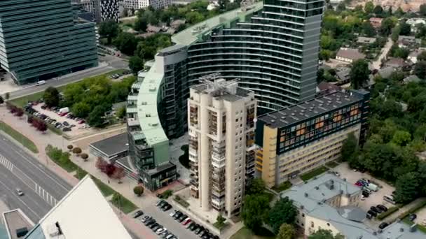 VILNIUS, LITHUANIA - JULY, 2019: Aerial drone view of the buildings of business centers of the new district in Vilnius. — Stockvideo