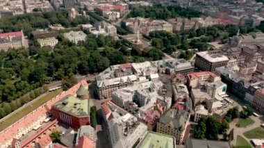 RIGA, LATVIA - MAY, 2019: Aerial view of the old Rigas roofs, city park and Brivibas square with monument of freedom.