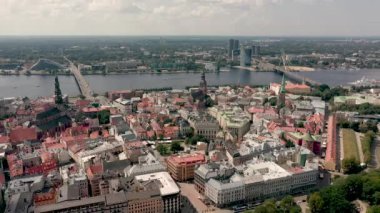 RIGA, LATVIA - MAY, 2019: Aerial view of the old city centre of Riga, Daugava river and exit to the city park.
