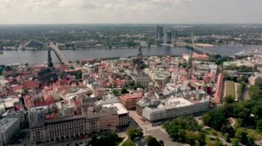 RIGA, LATVIA - MAY, 2019: Aerial view of the old city centre of Riga, Daugava river and exit to the city park.