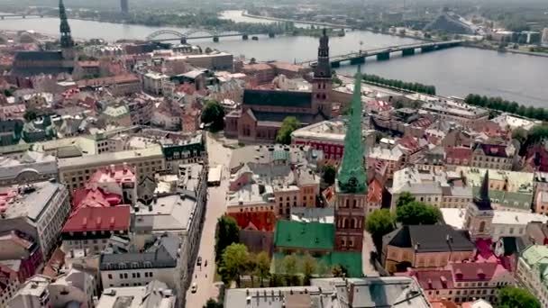 RIGA, LATVIA - MAY, 2019: Aerial panorama view of the roofs, Rigas cathedrales and city landscapes near Daugava river. — 비디오