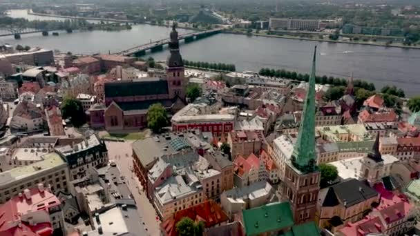 RIGA, LATVIA - MAY, 2019: Aerial top view of the famous spiers of the Rigas cathedrales in old city of Latvian capital. — Wideo stockowe