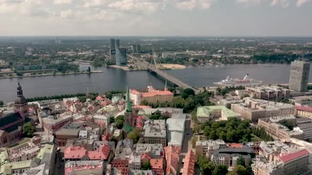 RIGA, LATVIA - MAY, 2019: Aerial panorama view of the beautiful Rigas old city and Vansu bridge over the Daugava river. — Stock video