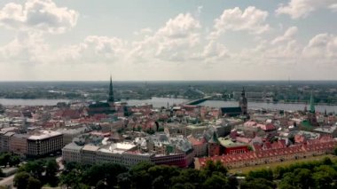 RIGA, LATVIA - MAY, 2019: Aerial top view of the old city centre of Riga located on the embankment of the Daugava river.