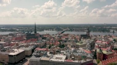 RIGA, LATVIA - MAY, 2019: Aerial top view of the old city centre of Riga located on the embankment of the Daugava river.