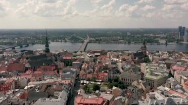 RIGA, LATVIA - MAY, 2019: Aerial top view of the old city centre of Riga located on the embankment of the Daugava river.