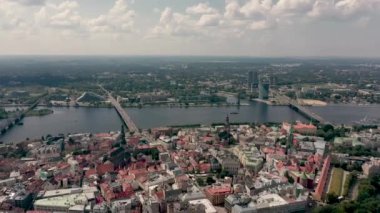 RIGA, LATVIA - MAY, 2019: Aerial top view of the old city centre of Riga, Vansu and stone bridge over the Daugava river.
