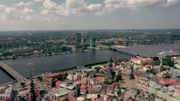 RIGA, LATVIA - MAY, 2019: Aerial panorama view of the old city centre of Riga and Vansu bridge over the Daugava river. — Stockvideo