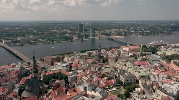 RIGA, LATVIA - MAY, 2019: Aerial top view of the old city centre of Riga, Vansu and stone bridge over the Daugava river. — Stockvideo