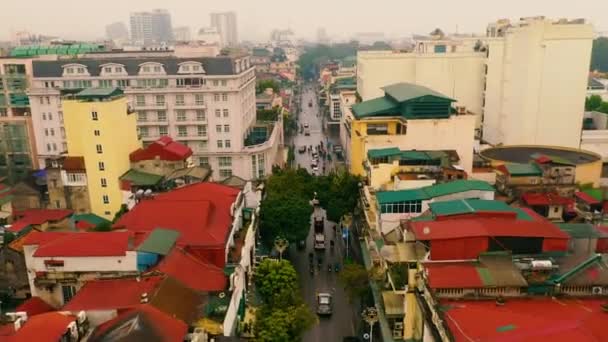 HANOI, VIETNAM - APRIL, 2020: Aerial panorama view of the roofs of houses of one of the districts of the city of Hanoi. — Stock Video