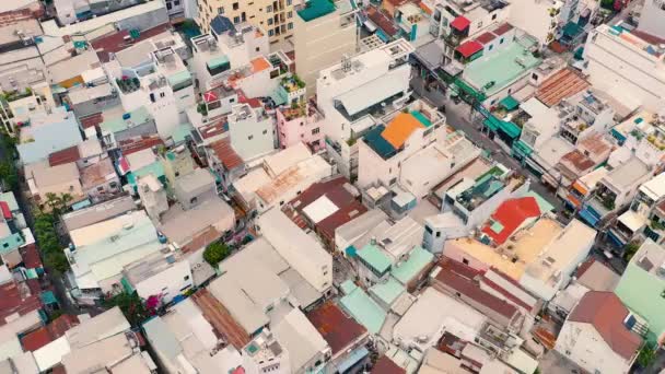 HOCHIMINH, VIETNAM - APRIL, 2020: Aerial panorama view of the roofs of houses of one of the districts of Hochiminh. — Stock Video