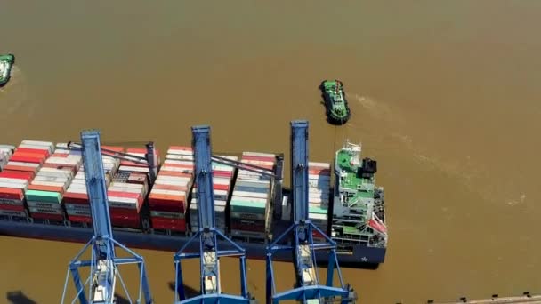 HOCHIMINH, VIETNAM - APRIL, 2020: Aerial panorama view of the laden ship and cranes in the port of Hochiminh. — Stock Video