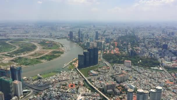 HOCHIMINH, VIETNAM - APRIL, 2020: Aerial drone view of skyscrapers and other modern buildings at downtown of Hochiminh. — Stock Video