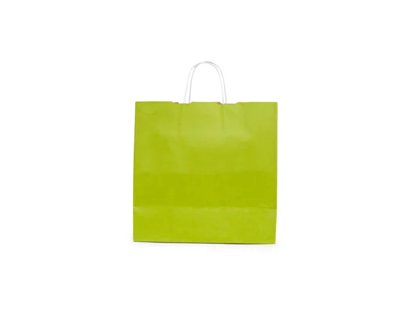 白い背景に隔離された緑のショッピングバッグ — ストック写真