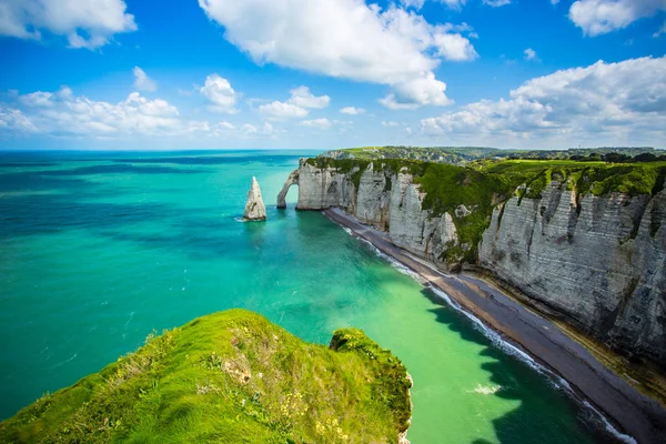 Etretat, Manneporte natural rock arch and its beach. Normandy, F ...