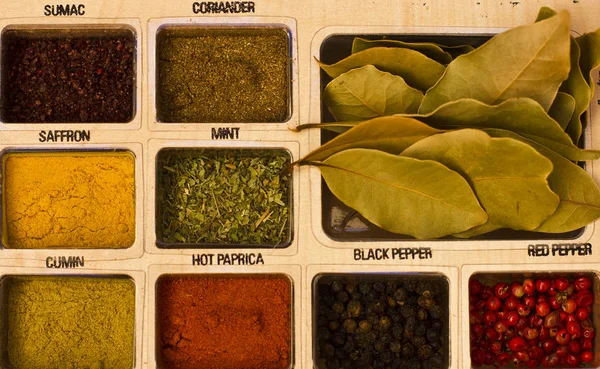 Spices, kitchen herbs and flavoring — Stock Photo, Image