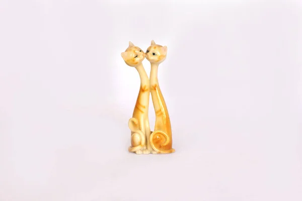 Porcelain statuette of two cats kiss