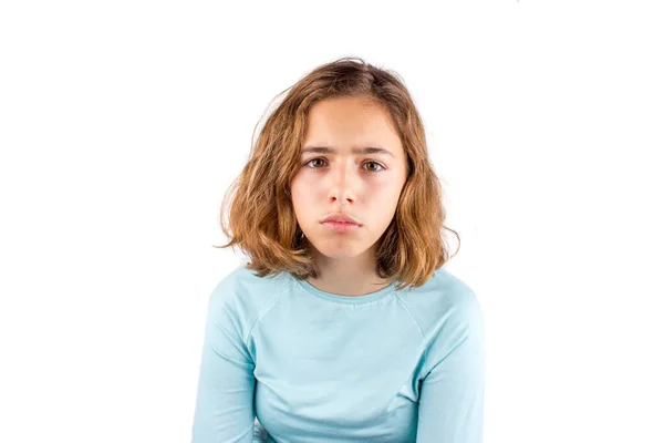 Sad teenager girl isolated. Pretty curly young girl with big eye looking to camera — ストック写真