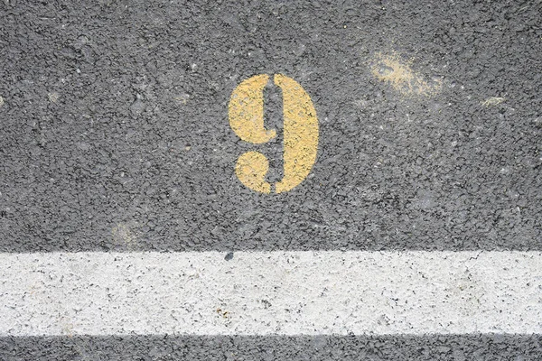 Road parking, Top view of asphalt road with signs as road markings on a street Labels No.9