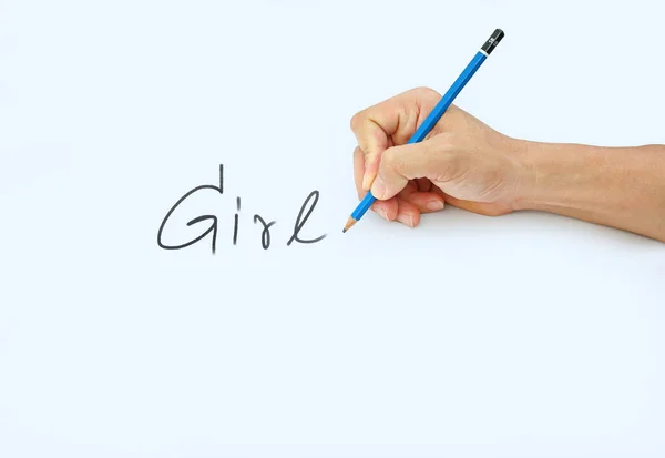 手拿着铅笔在白皮书的背景下，用词"女孩铅笔写字 " — 图库照片