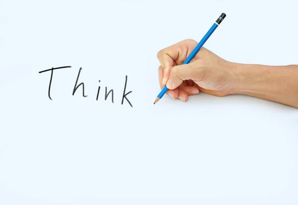 Рука тримає олівець на білому папері, пишучи олівцем для слова " Подумайте  " — стокове фото