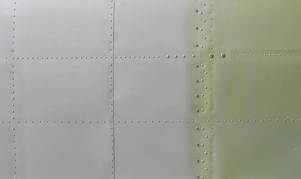 Metalowej powierzchni samolotów wojskowych — Zdjęcie stockowe