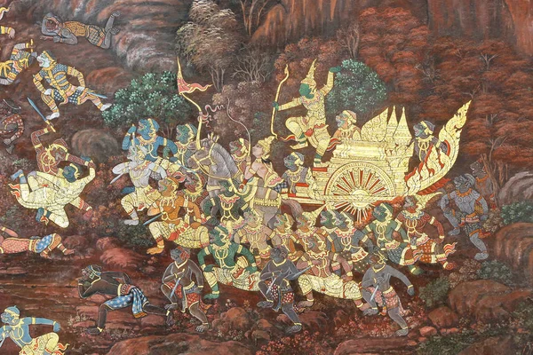 Traditional Thai painting art about Ramayana story on display at the temple wall