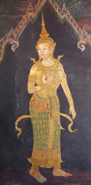 Traditional Thai painting art about Ramayana story on display at the temple wall