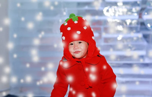 Happy little girl playing in snow, outdoors in winter — Stock Photo, Image