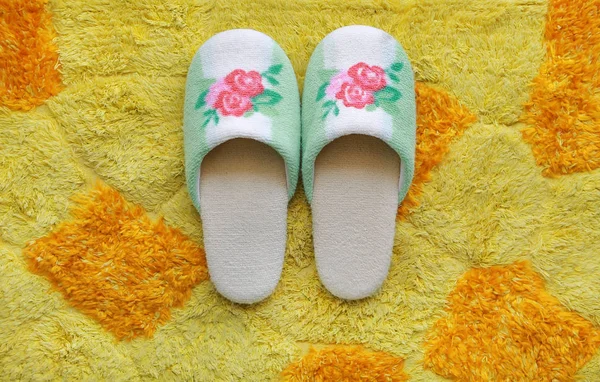 House slippers on yellow - orange Carpet background — Stock Photo, Image