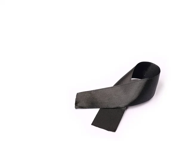 Ruban noir texture tissu arc avec espace de copie, Ruban symbole de sensibilisation de la campagne de commémoration ou deuil sur la mort de la personne, Priez pour la paix mondiale concept — Photo