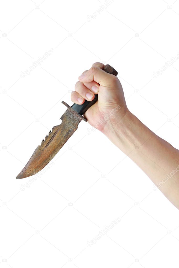 Hand holding rusty old knife with black leather handle isolated on a white background