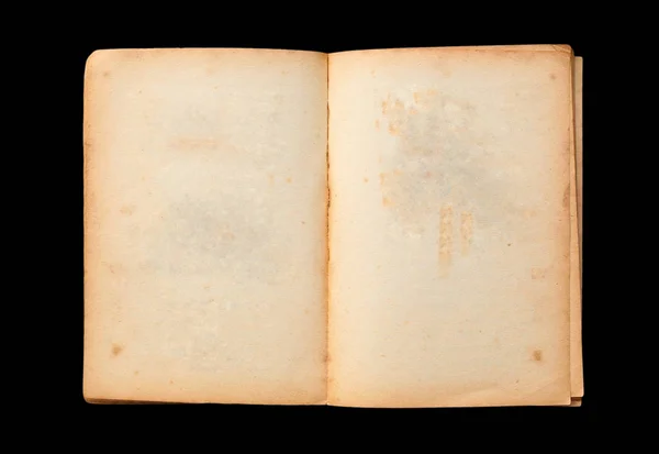 En gammal öppen bok med tomma gul färgade sidor isolerade på svart bakgrund — Stockfoto
