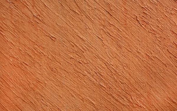 Een oranje betonnen wand. — Stockfoto