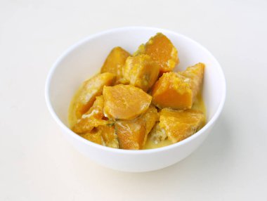 Tay tatlı şurup beyaz Kupası'nda kabak