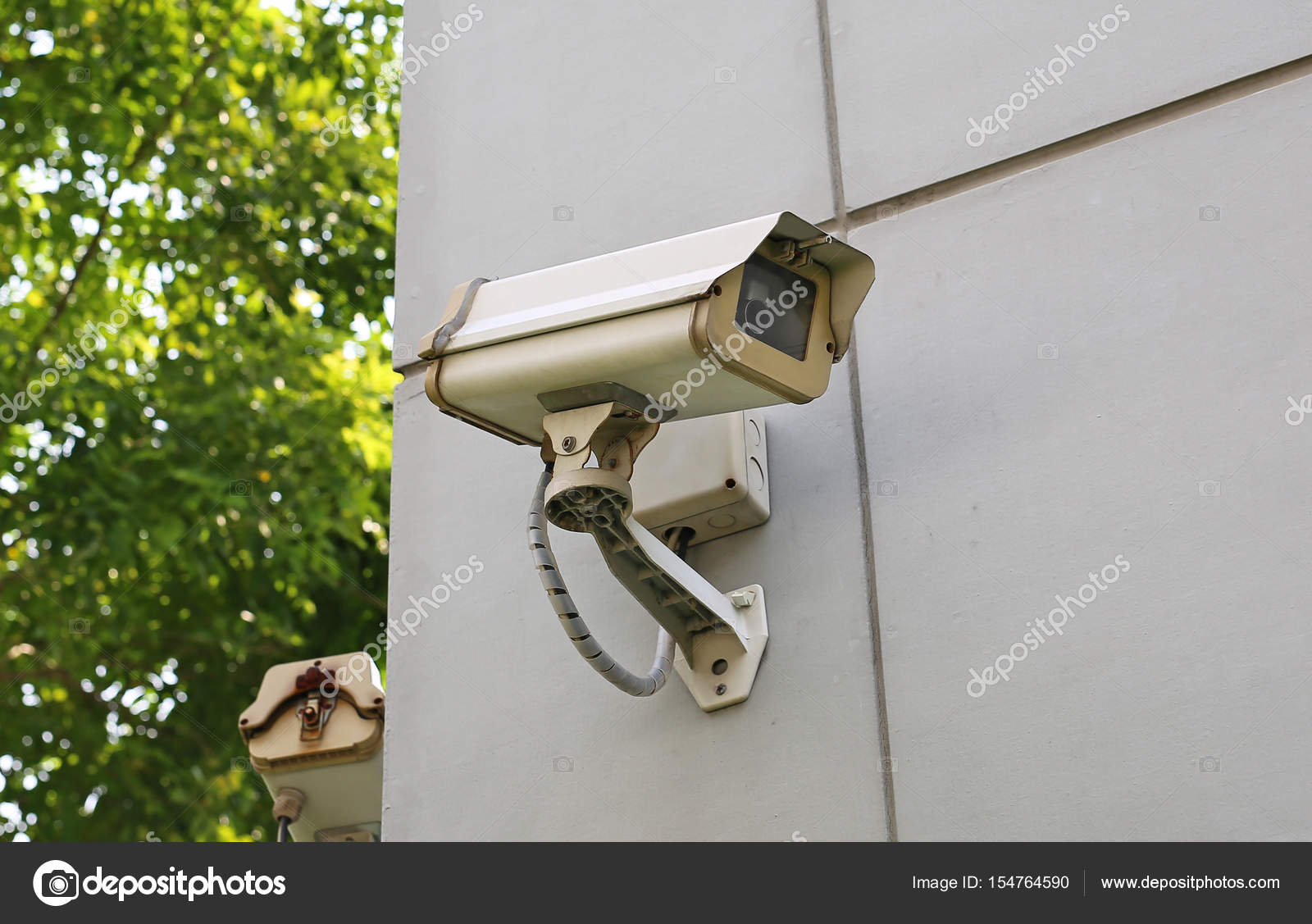 Old cctv camera on wall — Stock Photo ©