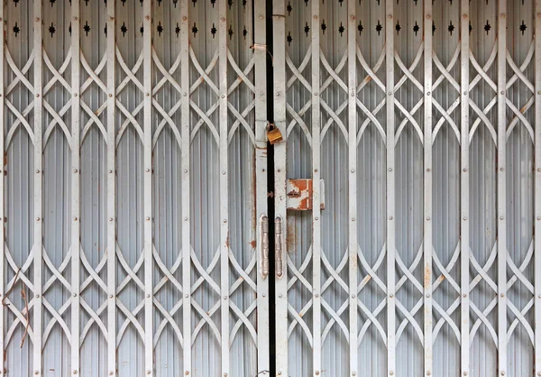 Patrón de textura de puerta de acero viejo o fondo de puerta de acero con metal oxidado. Grunge retro vintage de puerta de acero para el diseño . —  Fotos de Stock