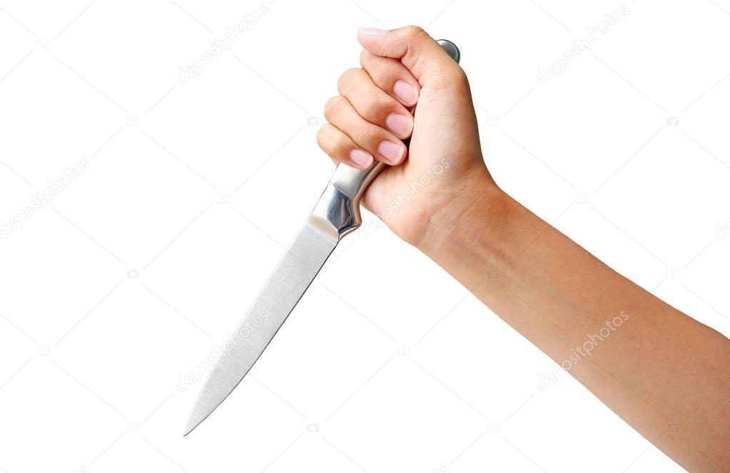 Hand holding a knife ready to strike down on white background
