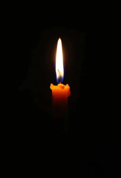 Candle flame on black. — Stock Photo, Image