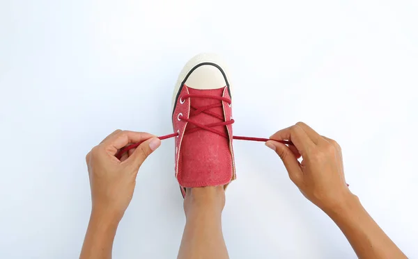 Krawatte ihre Schuhe Canvas Turnschuhe auf weißem Hintergrund — Stockfoto