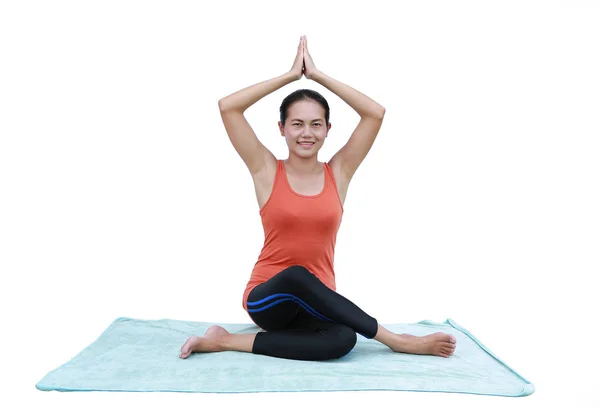 Asian Young woman doing yoga exercises isolated on white background — Stock Photo, Image