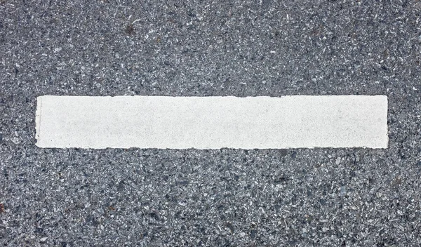 Asphalt road texture with white stripe