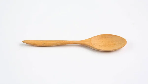 Wooden spoon isolated over white — Stock Photo, Image