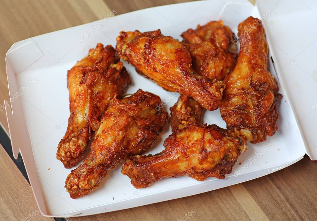 Hot and Spicey Buffalo Chicken Wings in cardboard delivery box — Stock