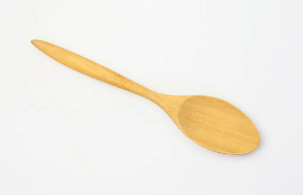 Wooden spoon on white background — Stock Photo, Image