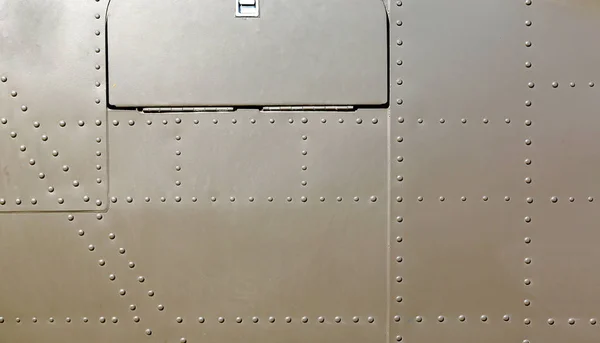 Metalen oppervlak van militaire vliegtuigen — Stockfoto
