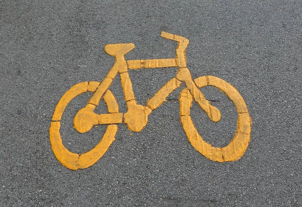 Sinal de bicicleta na superfície da rua — Fotografia de Stock