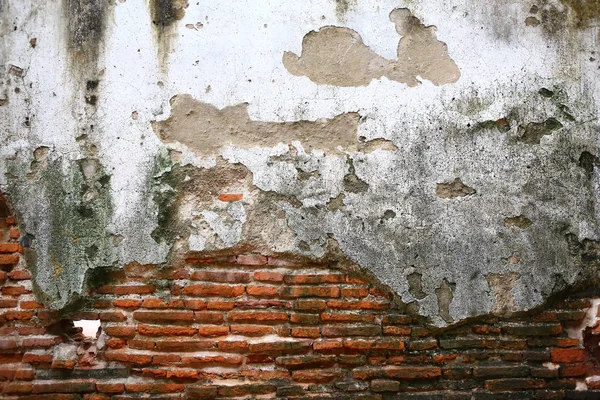 Tuğla duvar eski kırık alçı