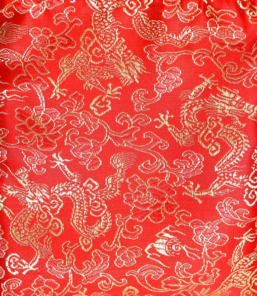 Estilo chino paño rojo, dragón y patrón de flores — Foto de Stock