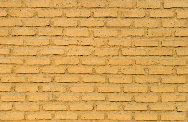Барвистий жовтий цегляний фон стіни — стокове фото
